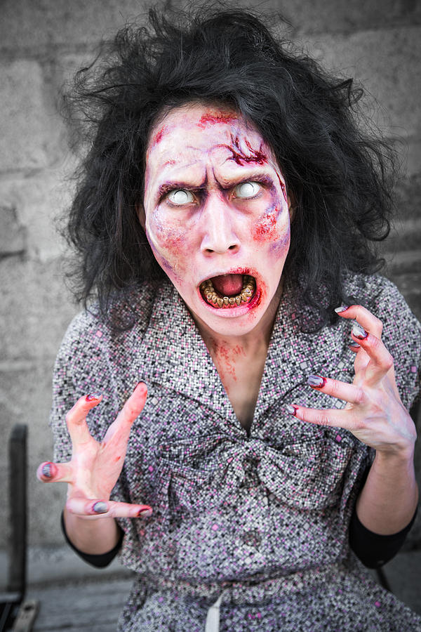 Scary screaming zombie woman Photograph by Matthias Hauser