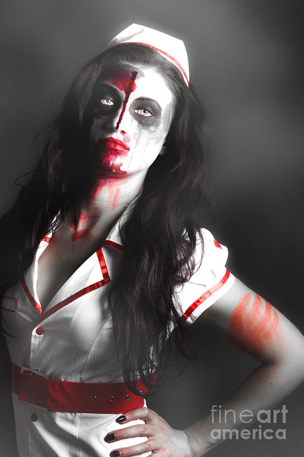 Scary zombie nurse with facial wounds Photograph by Jorgo Photography