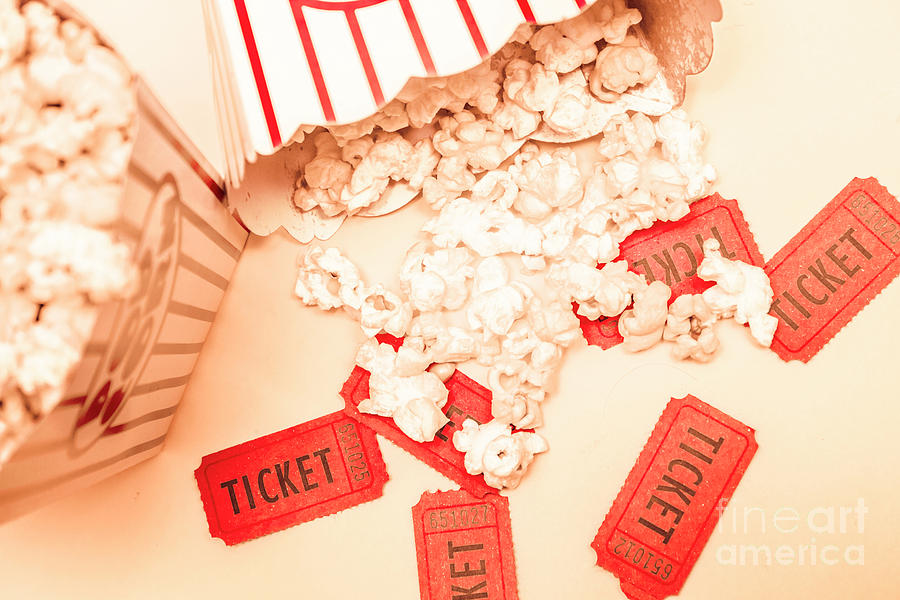 Scattered box of popcorn over tickets Photograph by Jorgo Photography
