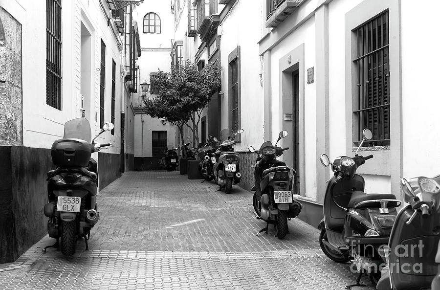 Scooter Parking in Seville Photograph by John Rizzuto