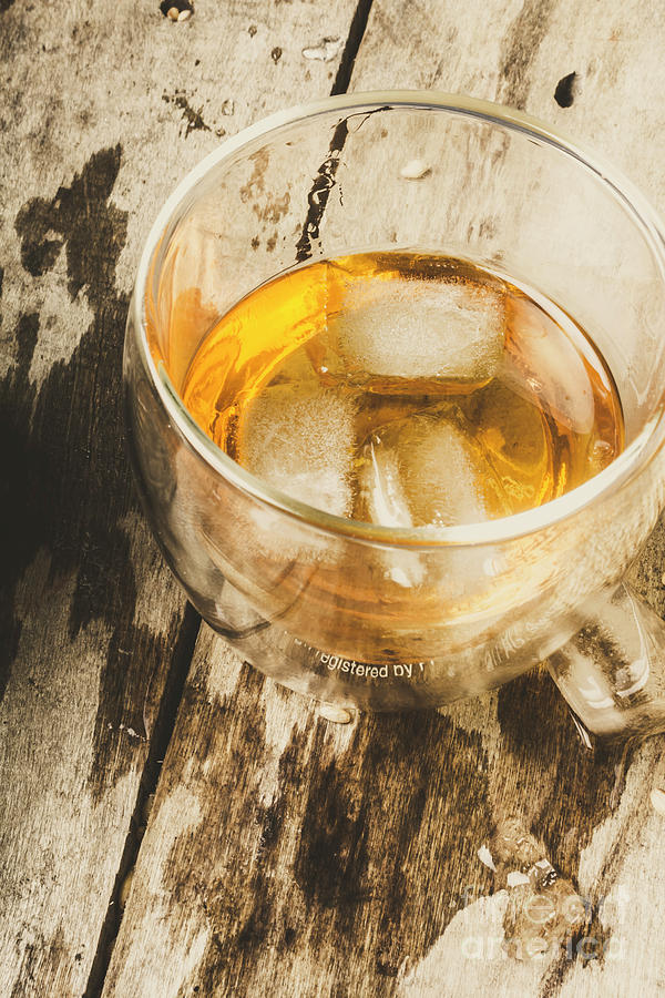 Scotch whisky on frosted oak Photograph by Jorgo Photography