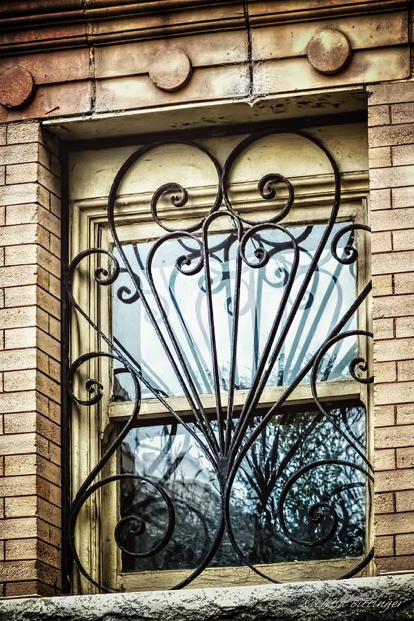 Scrolled Reflections, Window and Wrought Iron Grillwork Photograph by Melissa Bittinger