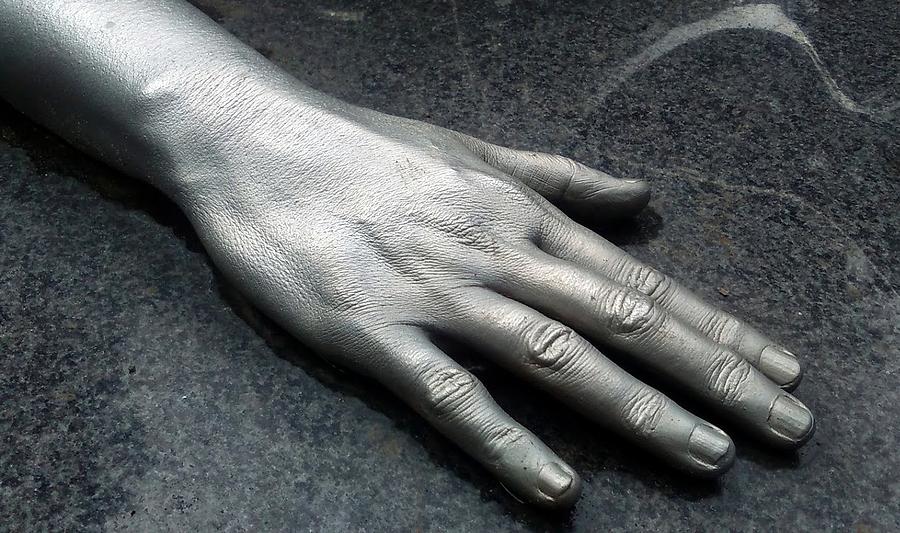 Sculptured Hand In New Orleans Photograph by Michael Hoard