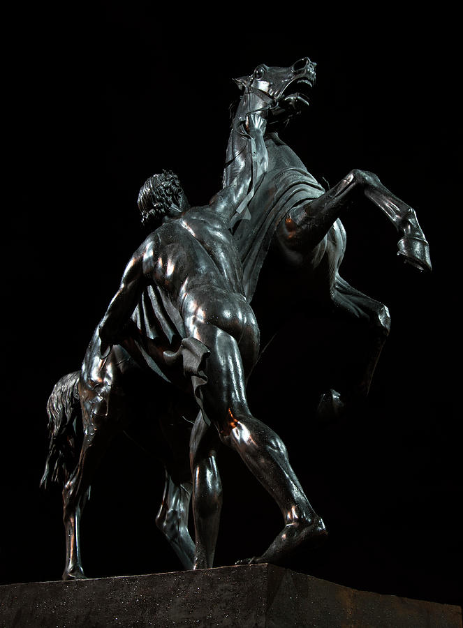 Sculptures of Sankt Petersburg - Man stopping a horse Photograph by Jaroslaw Blaminsky