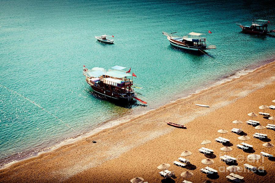 Sea boats in the laguna Photograph by Raimond Klavins