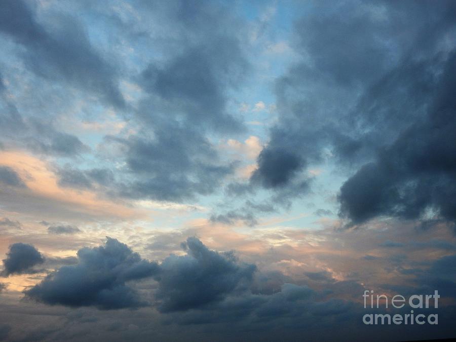 Sea Clouds Photograph by Jan Gelders