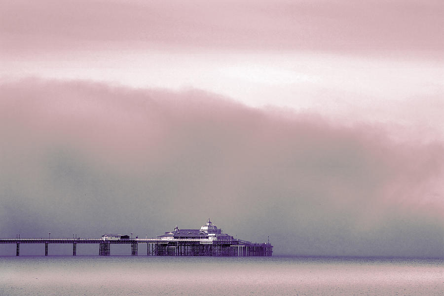 Sea mist replaces the Great Orme as the backdrop to Llandudno Pier Photograph by Mal Bray