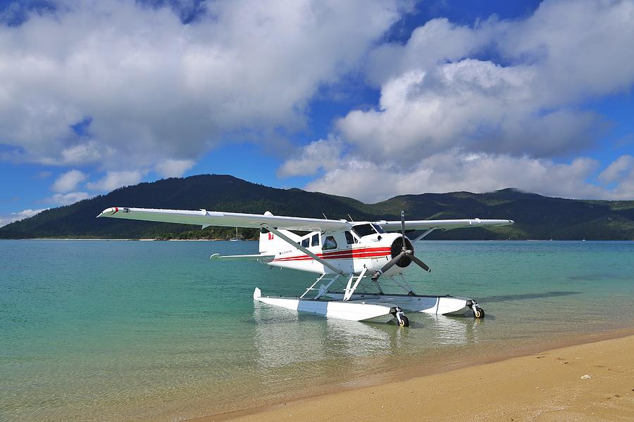 Paradise Photograph - Sea plane at Langford Island in the Whitsundays by Keiran Lusk