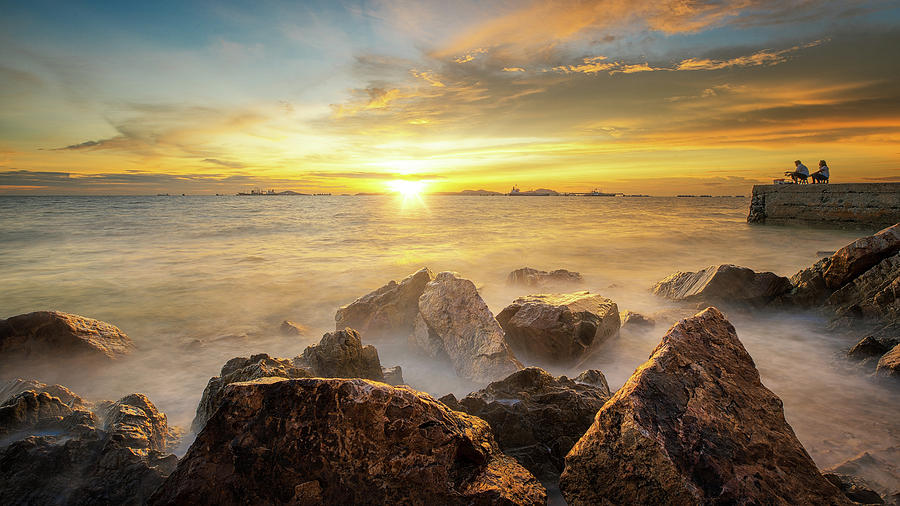 Sea Sand Rock Beach And Sunset Photograph by Anek Suwannaphoom