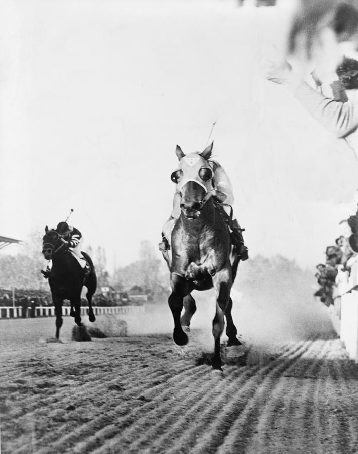 Seabiscuit Photograph - Seabiscuit Acrossing The Finish Line by Everett