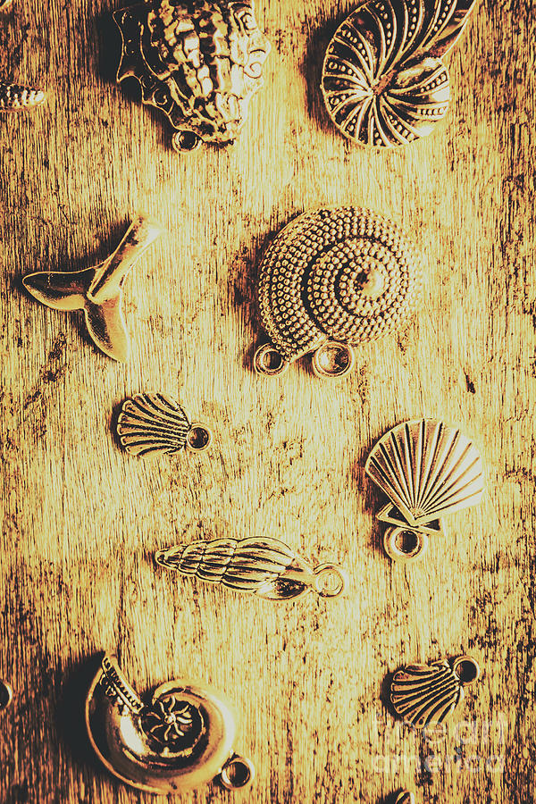 Summer Photograph - Seashell Shaped Pendants On Wooden Background by Jorgo Photography