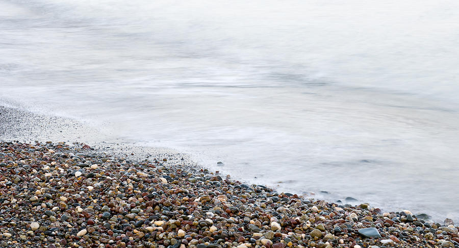 Seashore  waves and stones abstract Photograph by Michalakis Ppalis