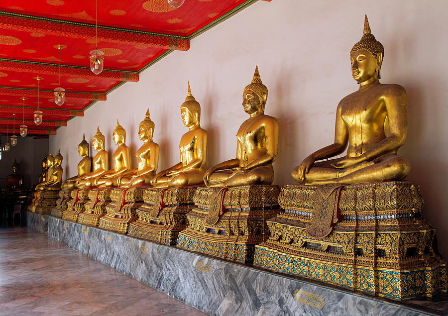 Seated Buddhas Photograph by David Freuthal