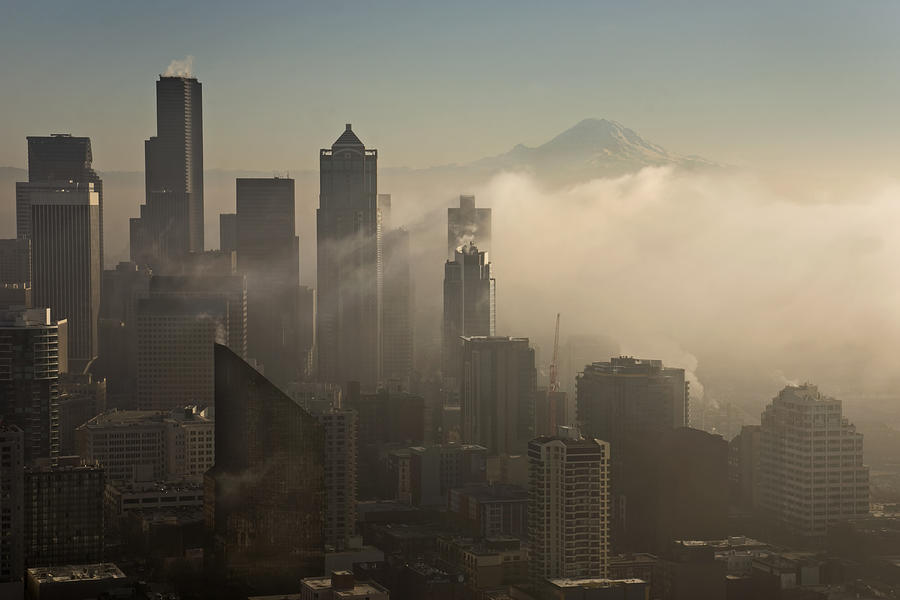 Seattle Skyline in the fog Photograph by Inge Riis McDonald
