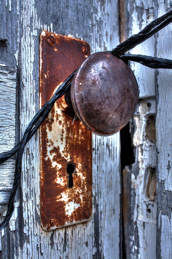 Secure Door Knob Photograph by David Matthews