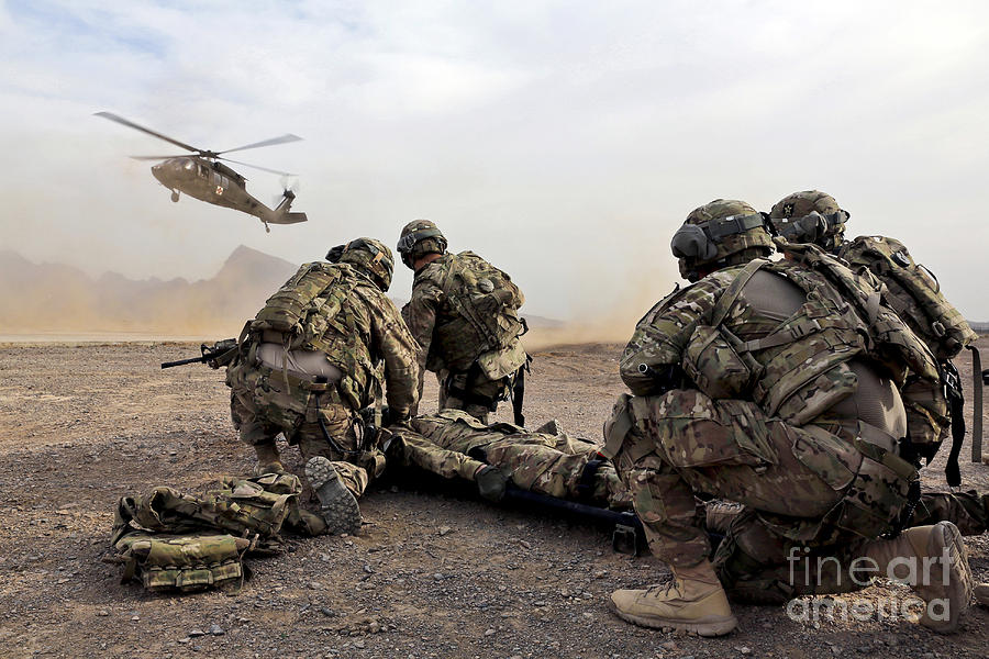 Helicopter Photograph - Security Force Team Members Wait by Stocktrek Images