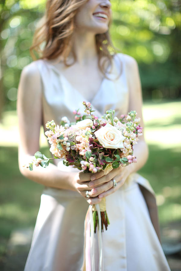 Flower Photograph - Selective Focus Of Brides Bouquet by Gillham Studios