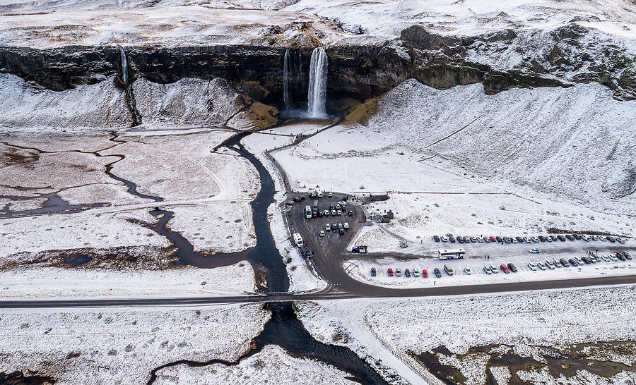 Seljalandsfoss waterfalls in winter, iceland Photograph by Pradeep Raja PRINTS