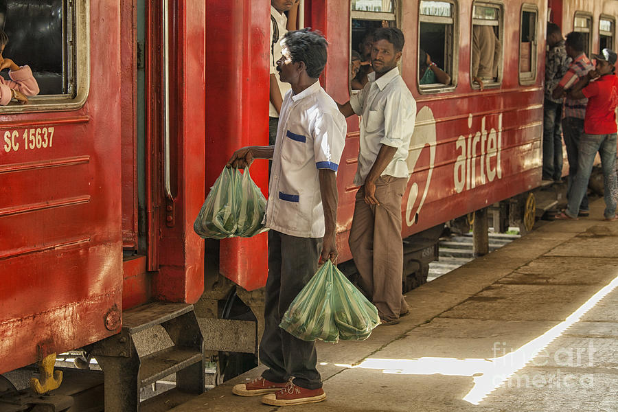 Selling Fruit To Train Passengers Photograph