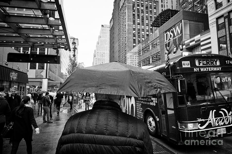man walking with umbrella