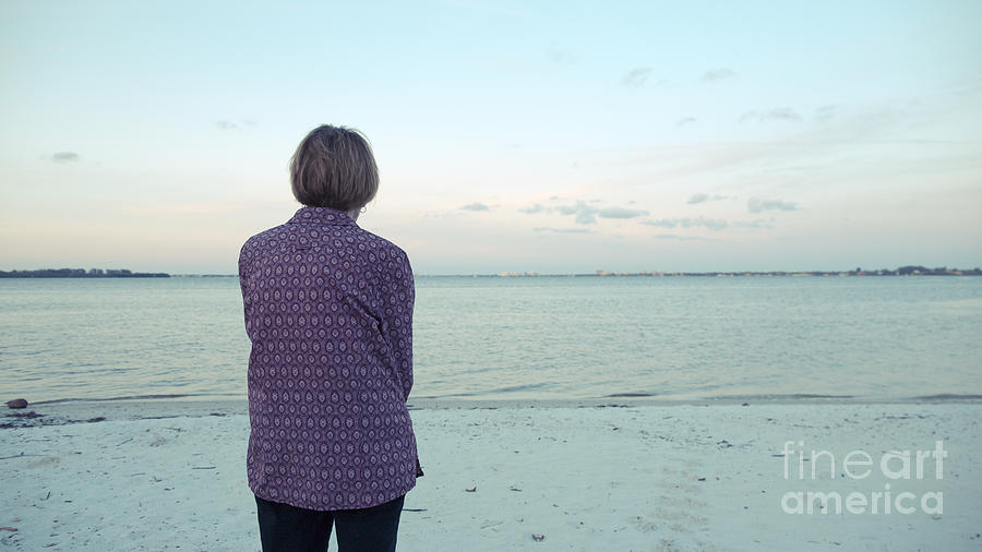 Senior Woman on the beach  Photograph by Edward Fielding
