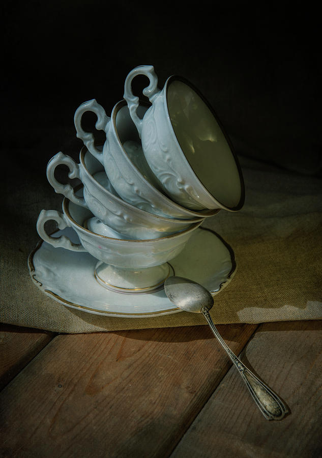 Set of white porcelaine teacups Photograph by Jaroslaw Blaminsky