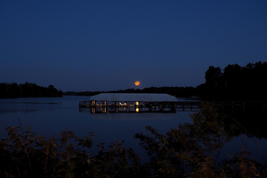Setting Full Moon over Reservoir Photograph by Shoeless Wonder