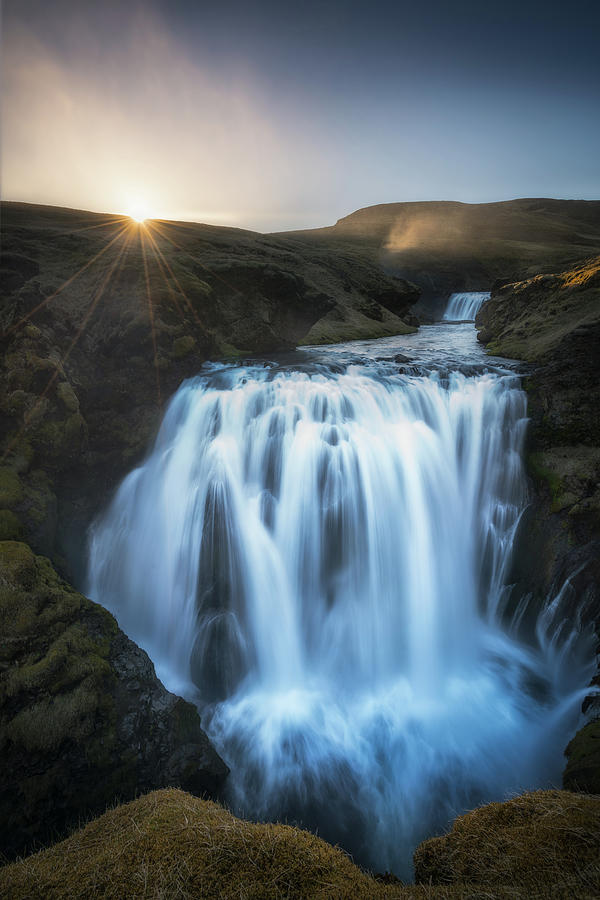 Setting Sun Above Iceland Waterfall Photograph