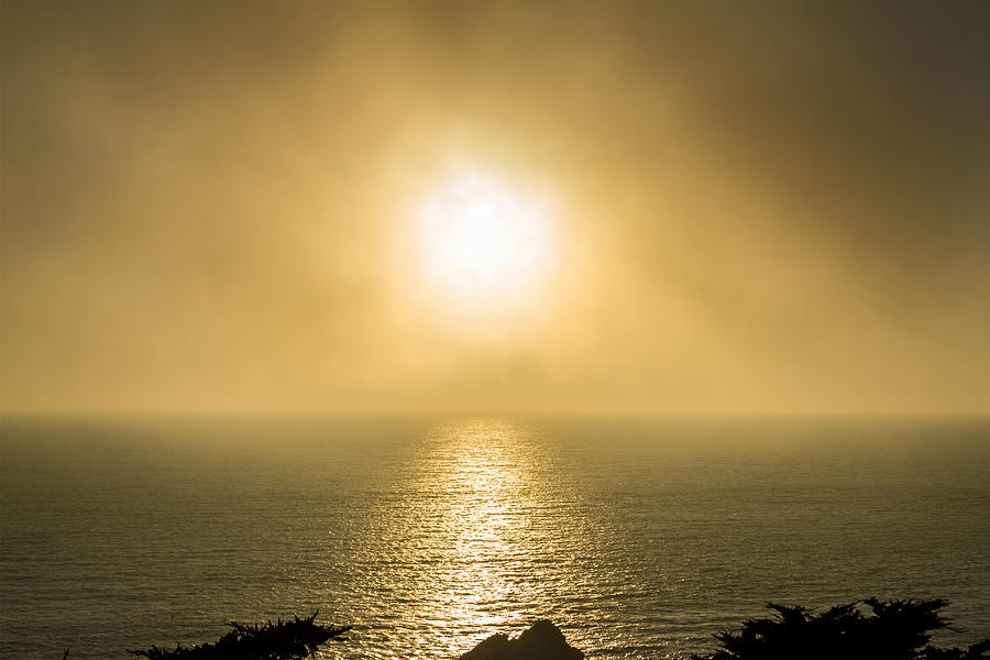 Setting Sun with Fog Photograph by Bonnie Follett