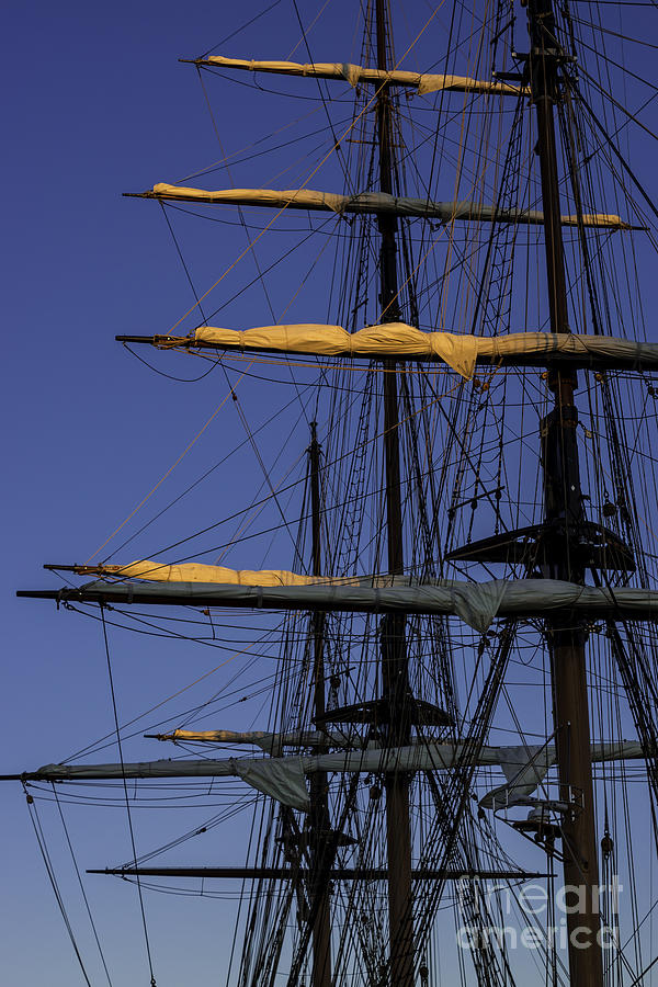 Abstract Photograph - Setting Through The Masts by Joe Geraci