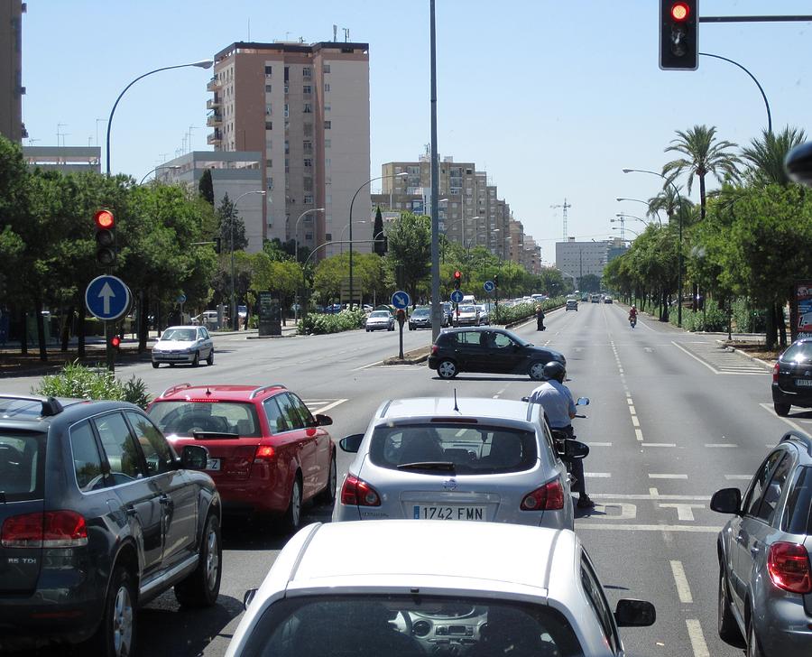 Seville Street Intersection Scene and High Rise Buildings Spain Photograph by John Shiron