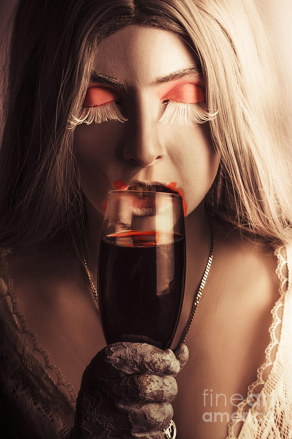 Vampire girl with holding glass of blood Photograph by Jorgo Photography