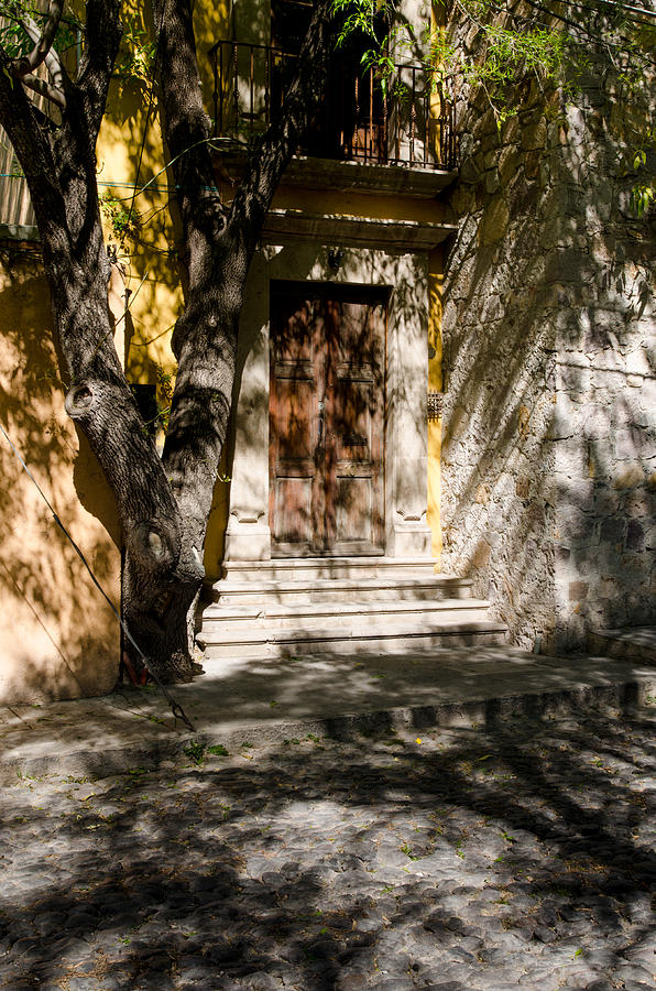 Shaded Entrance, Cobbled Road. Photograph by Rob Huntley