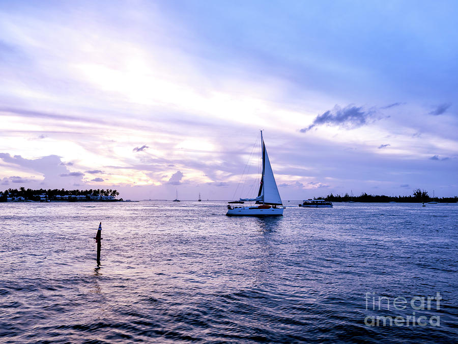 Shades of Blue at Night in Key West Photograph by John Rizzuto