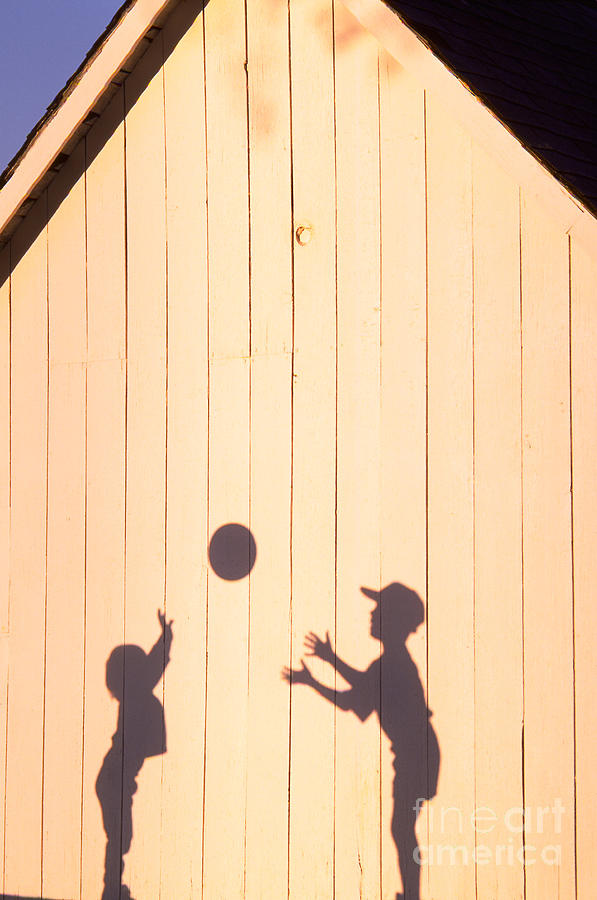 Shadow Of Kids Playing Catch With Ball Photograph by Jim W Grace