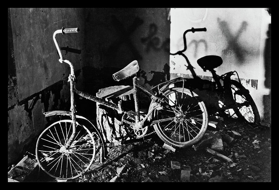 Shadow persuit - rusty bicycle Photograph by Dirk Ercken