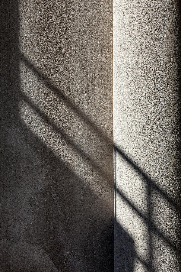 Shadows on Building Wall Photograph by Robert Ullmann