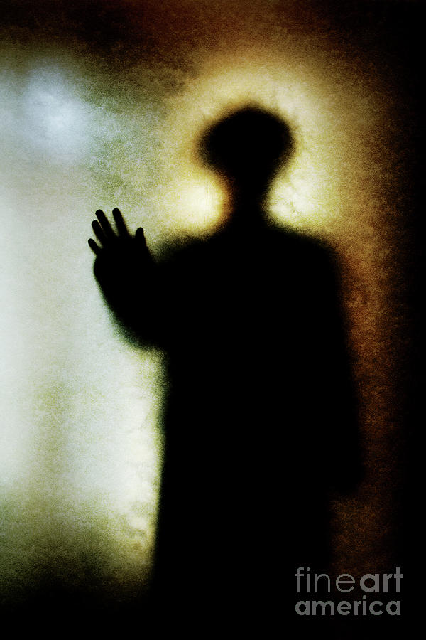 Shadowy man with hand outstretched Photograph by Clayton Bastiani