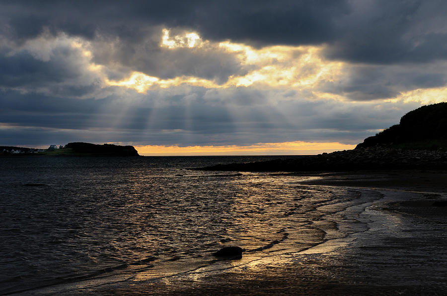 Shafts of sunlight at Port Hood shores Cape Breton Island Nova S Photograph by Reimar Gaertner