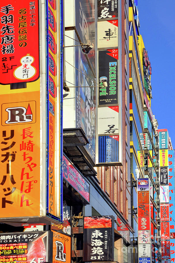 Shinjuku signs in Tokyo, Japan Photograph by Delphimages Photo Creations