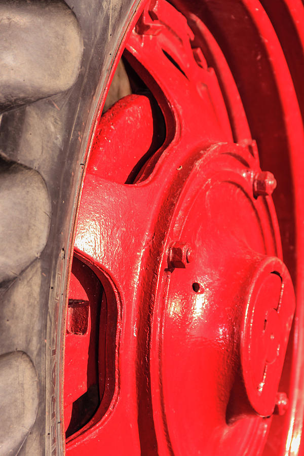Shiny Red Tractor Wheel Photograph by Joni Eskridge