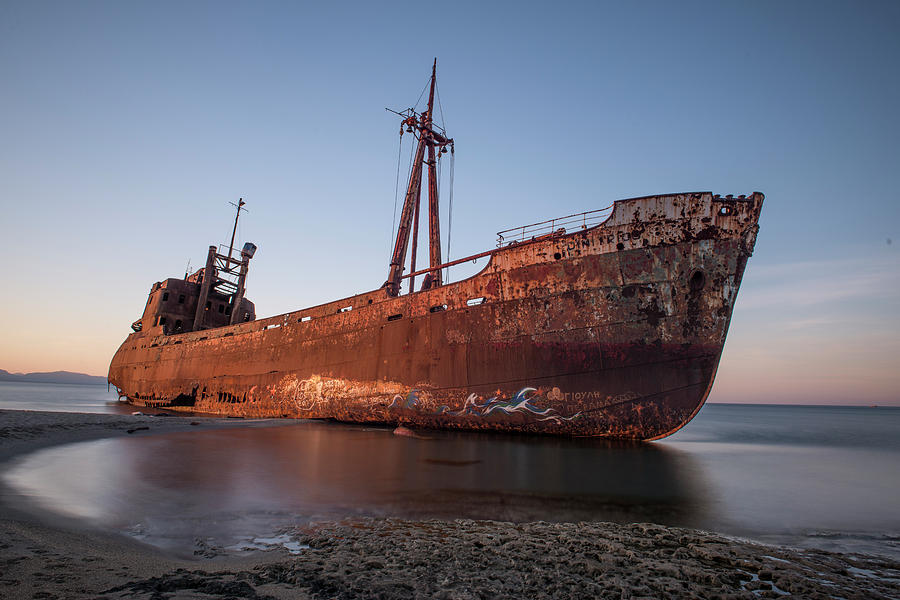 Ship wreck on the beach Photograph by Jaroslaw Blaminsky