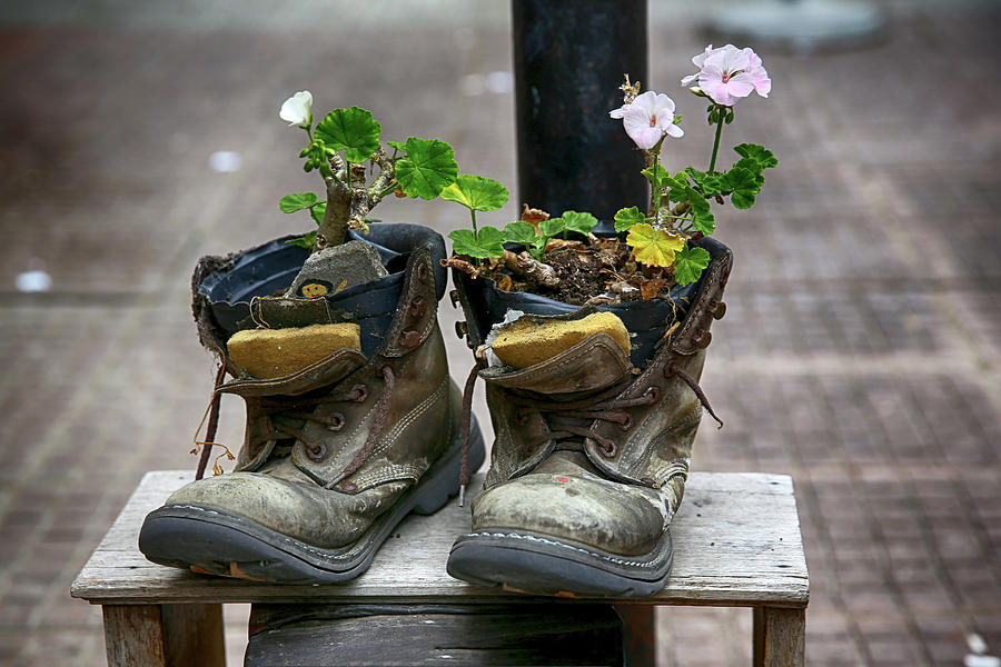 Shoes on a Montevideo Street Photograph by John Haldane