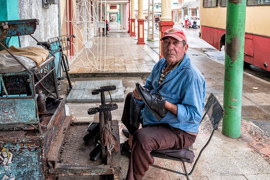 Shoeshine Man Cuba Photograph by Roberta Kayne
