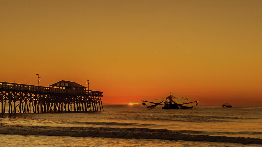 Shrimping at sunrise Photograph by Joe Granita