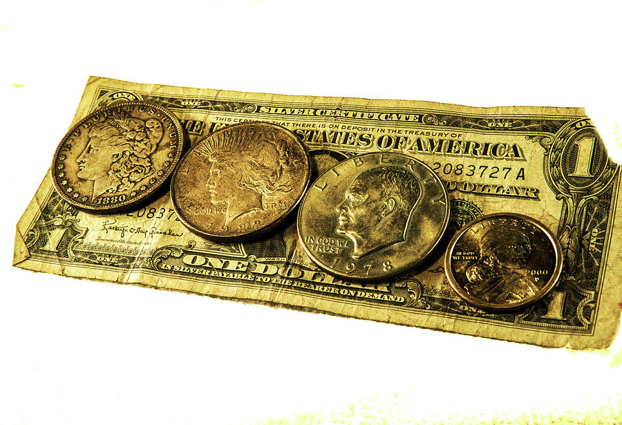 Shrinking Dollars Photograph by Jeff Kurtz