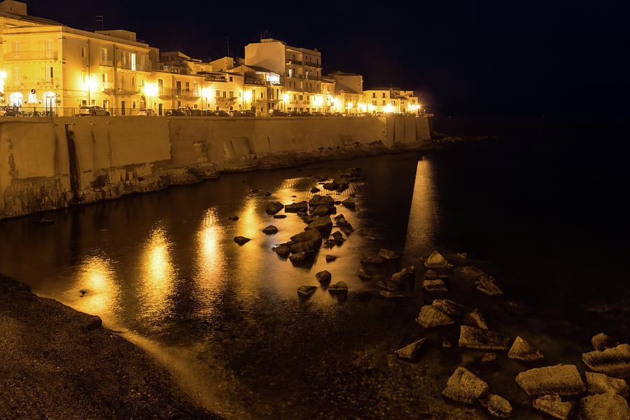 Sicilian Glow - Ortygia Island in Syracuse Sicily from the Sea Promenade Photograph by Georgia Mizuleva