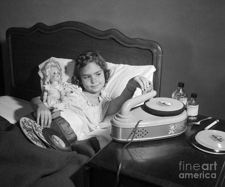 Sick Girl Playing Records, C.1950s Photograph by Debrocke/ClassicStock