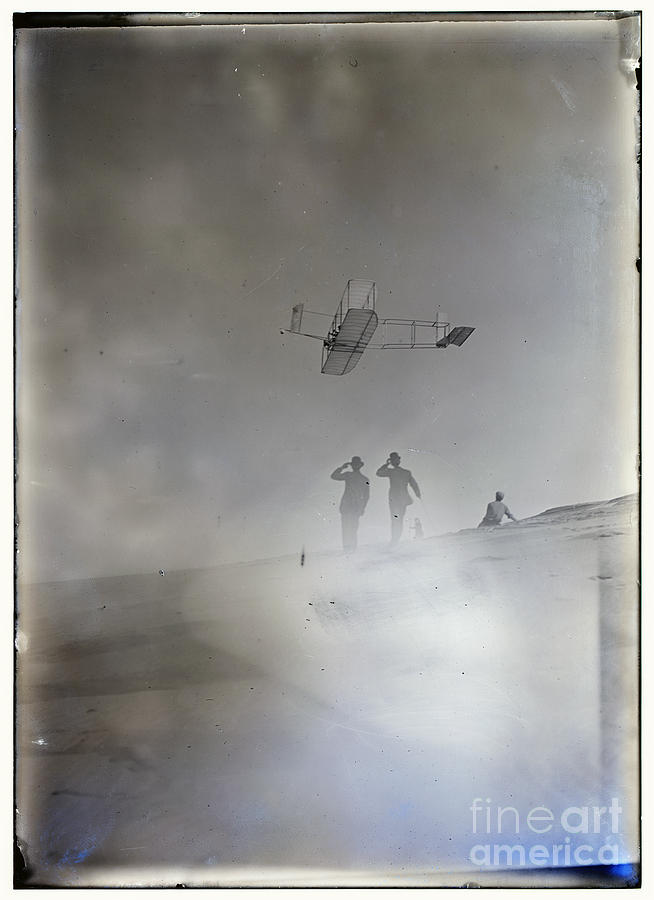 Wright Brothers Photograph - Side view from below of Orville soaring in level flight spectators looking up at glider Wright Broth by Vintage Collectables