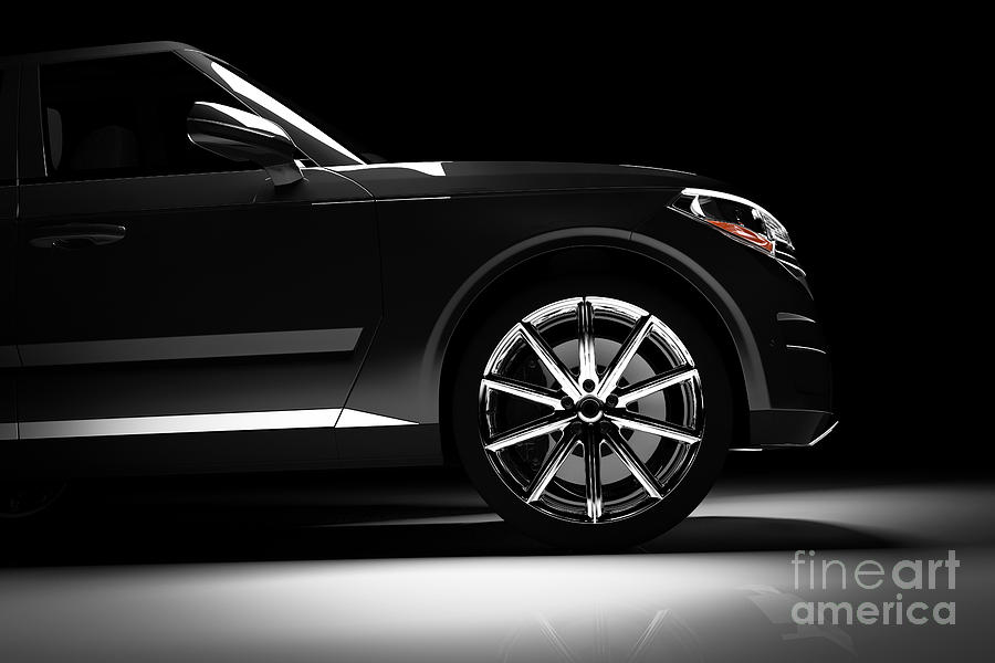 Side view of modern black SUV car in a spotlight Photograph by Michal Bednarek